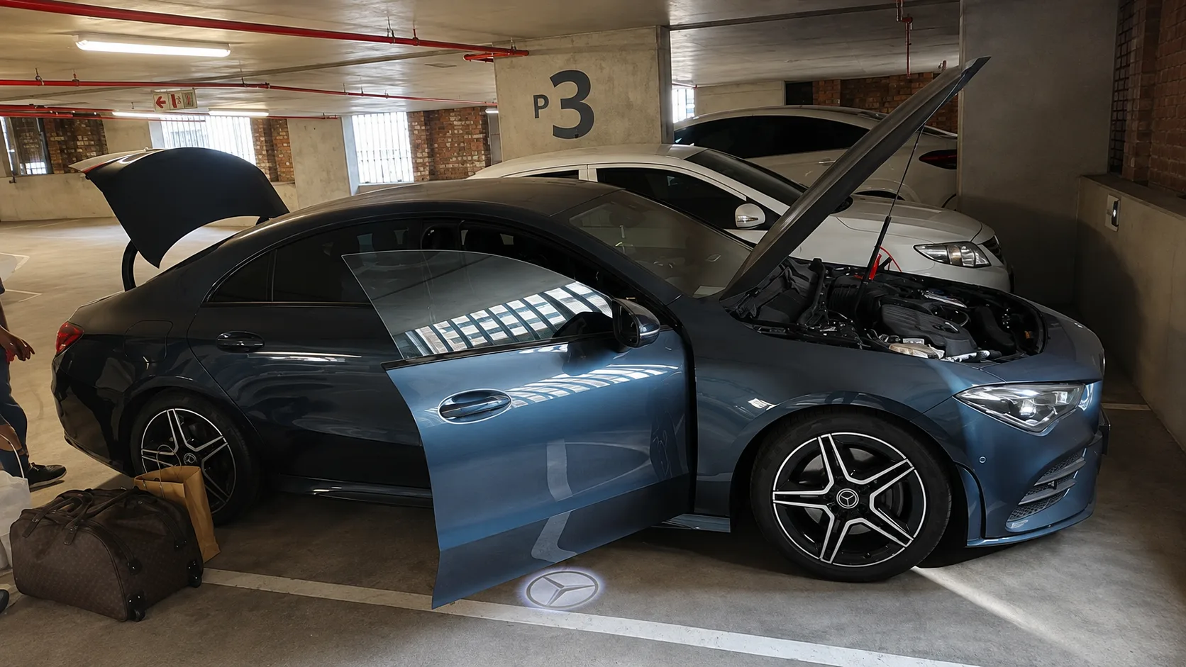 KCJ Batteries van attending a sedan in Cape Town
