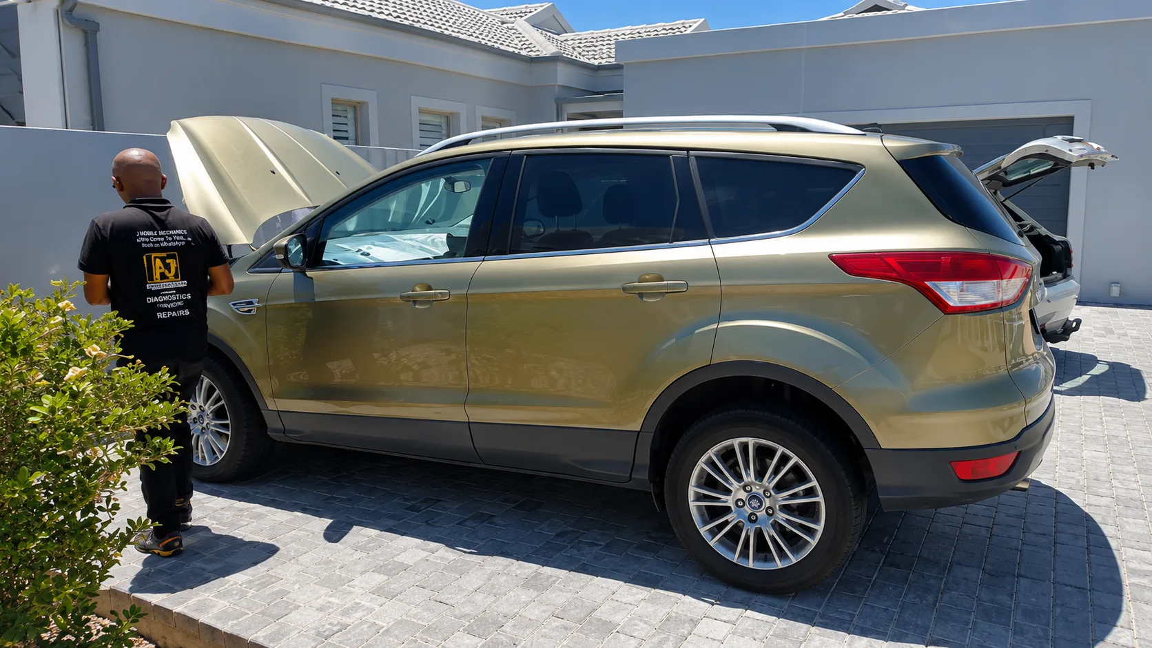 KCJ technician fitting a battery on an SUV in Cape Town